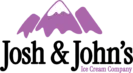a purple mountain with white snow on top